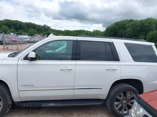 2020 Chevrolet Tahoe LT with VIN 1GNSKBKC8LR108377, listed as a IAAI auction lot 42545775 with 90,425 mi miles and . Bid and sale history available at DreamBid. Image 14.