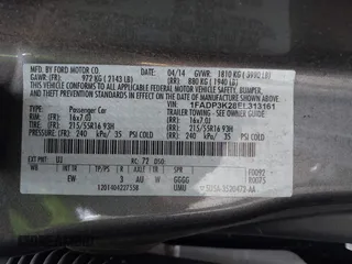 2014 Ford Focus SE with VIN 1FADP3K28EL313161, listed as a IAAI auction lot 42017640 with 111,962 mi miles. Bid and sale history available at carsss.com. Image 9.