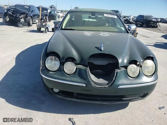 2007 Jaguar S-Type 3.0 with VIN SAJWA01A67FN78885, listed as a Copart auction lot 76619064 with 54,849 mi miles and Salvage Title. Bid and sale history available at carsss.com. Image 10.