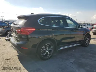 2019 BMW X1 sDrive28i with VIN WBXHU7C59K5N01520, listed as a Copart auction lot 44910215 with 44,239 mi miles and Salvage Title. Bid and sale history available at carsss.com. Image 3.