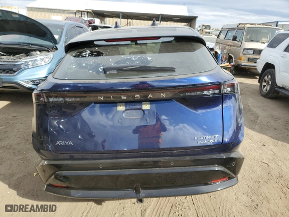2023 Nissan ARIYA PLATINUM+ with VIN JN1DF0CD0PM703229, listed as a Copart auction lot 76872324 with 26,429 mi miles and Salvage Title. Bid and sale history available at carsss.com. Image 6.