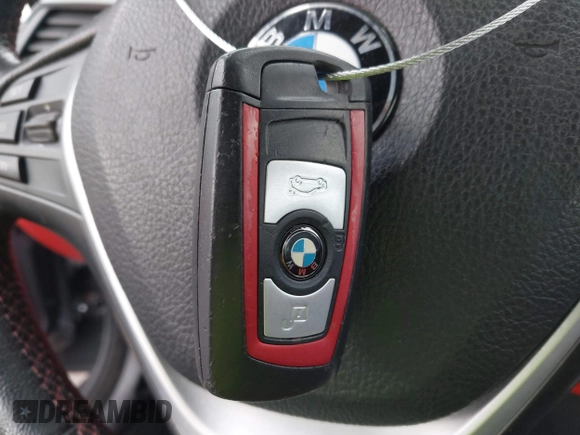 2015 BMW 4 Series 428i with VIN WBA3V7C54FP772531, listed as a IAAI auction lot 41487899 with 90,893 mi miles. Bid and sale history available at carsss.com. Image 11.