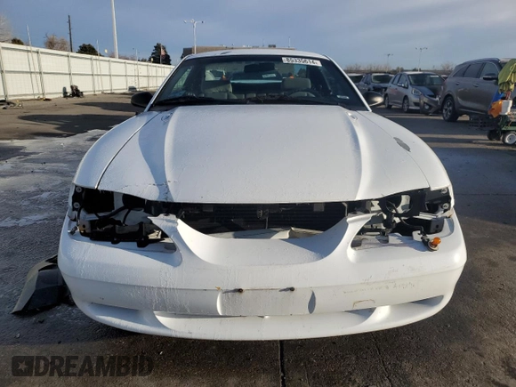 1997 Ford Mustang with VIN 1FALP4045VF120213, listed as a Copart auction lot 85335614 with 71,225 mi miles and Salvage Title. Bid and sale history available at carsss.com. Image 5.
