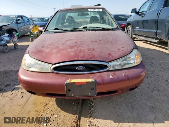 1999 Ford Contour LX with VIN 1FAFP66L2XK167281, listed as a Copart auction lot 64839335 with 256,227 mi miles and Clean title. Bid and sale history available at DreamBid. Image 5.