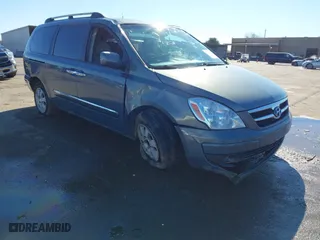 2007 Hyundai Entourage GLS with VIN KNDMC233176033493, listed as a IAAI auction lot 41632329 with 135,590 mi miles. Bid and sale history available at carsss.com. Image 1.