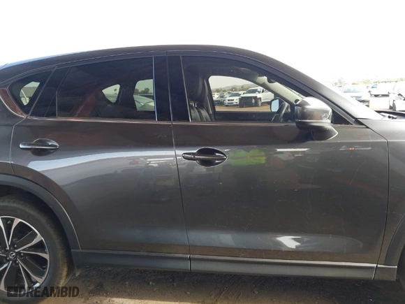 2022 Mazda CX-5 2.5 S Premium Package with VIN JM3KFBDM8N0555485, listed as a IAAI auction lot 41706120 with NaN miles. Bid and sale history available at carsss.com. Image 14.