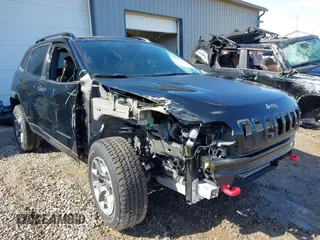 2022 Jeep Cherokee Trailhawk with VIN 1C4PJMBX0ND500947, listed as a IAAI auction lot 41691906 with 16,163 mi miles. Bid and sale history available at carsss.com. Image 1.