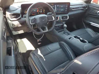 2024 Ford Mustang EcoBoost with VIN 1FA6P8TH0R5118769, listed as a Copart auction lot 52947385 with 8,296 mi miles and Salvage Title. Bid and sale history available at carsss.com. Image 8.