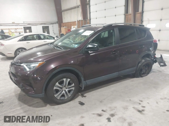 2018 Toyota RAV4 LE with VIN 2T3BFREV0JW759714, listed as a IAAI auction lot 41823084 with 119,909 mi miles and . Bid and sale history available at DreamBid. Image 2.