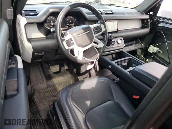 2023 Land Rover Defender S with VIN SALEJ6EX0P2173858, listed as a Copart auction lot 52773365 with 30,768 mi miles and Salvage title. Bid and sale history available at DreamBid. Image 8.