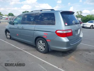 2005 Honda Odyssey EX-L z VIN 5FNRL38765B103871, wystawiony jako IAAI lot #42182984 z przebiegiem 203 555 mil mil oraz . Historia ofert i sprzedaży dostępna na DreamBid. Obrazek 3.