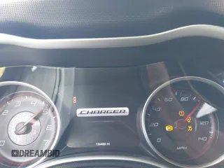 2015 Dodge Charger SXT with VIN 2C3CDXHG2FH852208, listed as a IAAI auction lot 42120021 with 156,486 mi miles and . Bid and sale history available at DreamBid. Image 7.