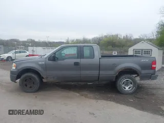 2007 Ford F-150 STX with VIN 1FTRX14W27NA19489, listed as a IAAI auction lot 42017455 with 222,297 mi miles. Bid and sale history available at carsss.com. Image 6.