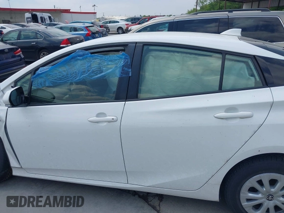 2020 Toyota Prius L Eco with VIN JTDKARFU9L3108236, listed as a IAAI auction lot 42004854 with 89,528 mi miles and . Bid and sale history available at DreamBid. Image 15.