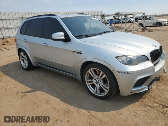 2011 BMW X5 M with VIN 5YMGY0C58BLK26357, listed as a Copart auction lot 71443774 with 116,973 mi miles and Salvage Title. Bid and sale history available at carsss.com. Image 4.