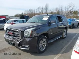 2015 GMC Yukon SLE with VIN 1GKS1AKCXFR269862, listed as a IAAI auction lot 41784763 with 156,286 mi miles. Bid and sale history available at carsss.com. Image 17.