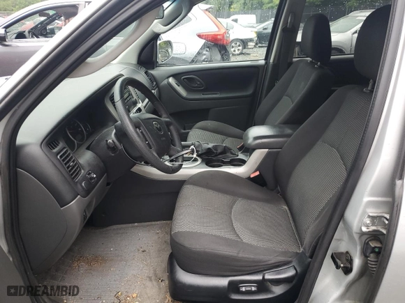 2005 Mazda Tribute LX with VIN 4F2YZ94185KM47932, listed as a Copart auction lot 63587744 with 203,178 mi miles and Salvage Title. Bid and sale history available at carsss.com. Image 7.