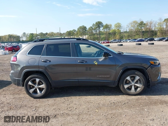 2022 Jeep Cherokee Limited with VIN 1C4PJMDX9ND509157, listed as a IAAI auction lot 42179093 with 34,638 mi miles and . Bid and sale history available at DreamBid. Image 13.