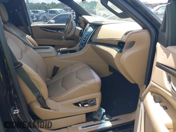 2019 Cadillac Escalade Platinum with VIN 1GYS4DKJ9KR138333, listed as a IAAI auction lot 42523430 with 104,787 mi miles and . Bid and sale history available at DreamBid. Image 5.