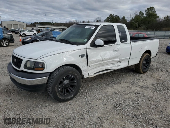 2002 Ford F-150 XL with VIN 1FTRX17W12NA96391, listed as a Copart auction lot 87000064 with 199,867 mi miles and Salvage Title. Bid and sale history available at carsss.com. Image 1.