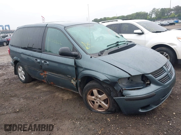 2005 Dodge Caravan SXT with VIN 1D4GP45R55B279825, listed as a IAAI auction lot 42532684 with 157,167 mi miles and . Bid and sale history available at DreamBid. Image 1.