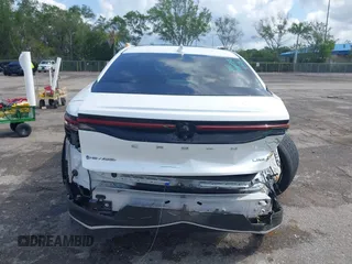 2024 Toyota Crown XLE z VIN JTDAAAAF4R3020760, wystawiony jako IAAI lot #42191441 z przebiegiem 99 630 mil mil oraz . Historia ofert i sprzedaży dostępna na DreamBid. Obrazek 17.