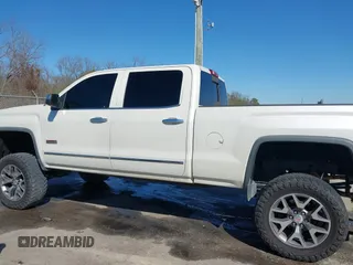 2014 GMC Sierra 1500 SLT with VIN 3GTU2VEC0EG208569, listed as a IAAI auction lot 41834893 with 128,731 mi miles and . Bid and sale history available at DreamBid. Image 14.