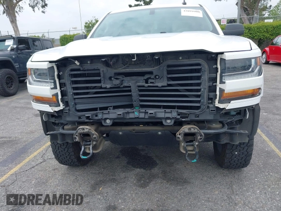 2018 Chevrolet Silverado 1500 Custom with VIN 1GCRCPEH6JZ274743, listed as a IAAI auction lot 42099900 with 61,008 mi miles and . Bid and sale history available at DreamBid. Image 6.
