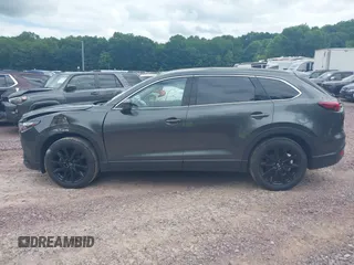2022 Mazda CX-9 Touring Plus with VIN JM3TCBAY2N0611876, listed as a IAAI auction lot 42369073 with 37,639 mi miles and . Bid and sale history available at DreamBid. Image 14.