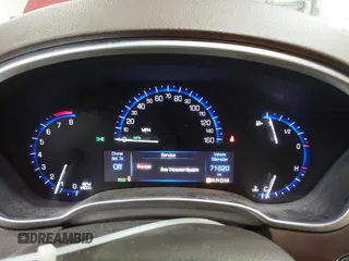 2014 Cadillac SRX Performance Collection z VIN 3GYFNCE30ES596415, wystawiony jako IAAI lot #42329771 z przebiegiem 71 620 mil mil oraz . Historia ofert i sprzedaży dostępna na DreamBid. Obrazek 7.