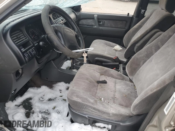 2000 Isuzu Trooper S with VIN JACDJ58X9Y7J18322, listed as a Copart auction lot 42444695 with 149,799 mi miles and Salvage title. Bid and sale history available at DreamBid. Image 7.
