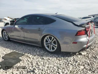 2016 Audi S7 with VIN WAUW2AFC5GN105817, listed as a Copart auction lot 76579934 with 112,894 mi miles and Clean Title. Bid and sale history available at carsss.com. Image 2.