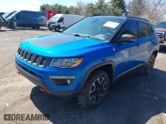2019 Jeep Compass Trailhawk with VIN 3C4NJDDB5KT683907, listed as a IAAI auction lot 41876584 with 54,685 mi miles and . Bid and sale history available at DreamBid. Image 2.