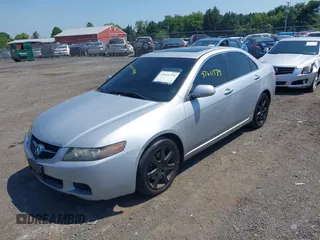 2004 Acura TSX w/Navigation with VIN JH4CL96954C028006, listed as a IAAI auction lot 42611739 with 266,243 mi miles and . Bid and sale history available at DreamBid. Image 2.