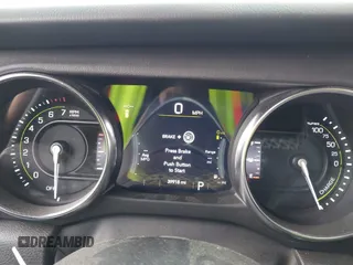 2023 Jeep Wrangler Sahara z VIN 1C4JJXP6XPW556327, wystawiony jako IAAI lot #41784532 z przebiegiem 39 918 mil mil oraz . Historia ofert i sprzedaży dostępna na DreamBid. Obrazek 7.