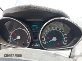 2017 Ford Fiesta SE z VIN 3FADP4BJ2HM134825, wystawiony jako IAAI lot #42331095 z przebiegiem 117 794 mil mil oraz . Historia ofert i sprzedaży dostępna na DreamBid. Obrazek 7.
