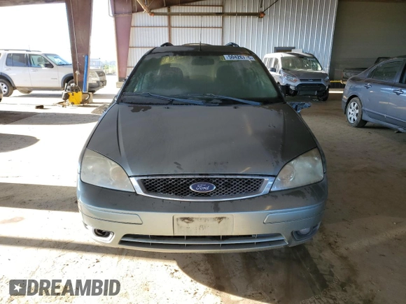2005 Ford Focus SE with VIN 1FAHP36N85W239888, listed as a Copart auction lot 50426775 with 302,828 mi miles and Clean Title. Bid and sale history available at carsss.com. Image 5.