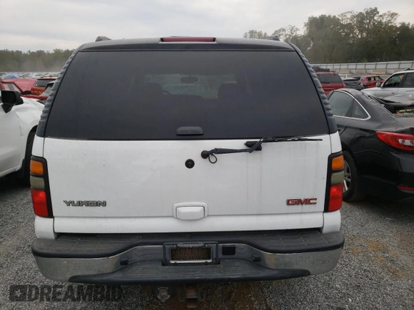 2006 GMC Yukon SLE with VIN 1GKEC13V96J109056, listed as a Copart auction lot 74724434 with 121,695 mi miles and Salvage Title. Bid and sale history available at carsss.com. Image 6.