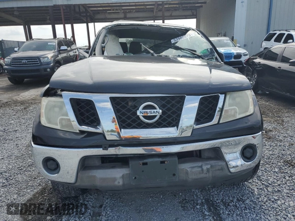 2010 Nissan Frontier Pro-4X with VIN 1N6AD0EV2AC401933, listed as a Copart auction lot 53980575 with 188,170 mi miles and Salvage title. Bid and sale history available at DreamBid. Image 5.