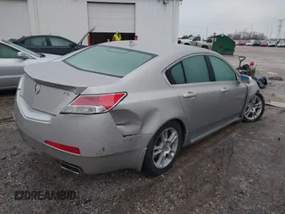 2009 Acura TL Tech with VIN 19UUA86569A020715, listed as a IAAI auction lot 41521211 with 179,977 mi miles. Bid and sale history available at carsss.com. Image 4.