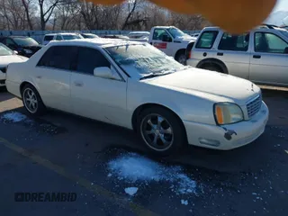 2003 Cadillac DeVille with VIN 1G6KD54Y03U227618, listed as a IAAI auction lot 41818005 with 104,721 mi miles. Bid and sale history available at carsss.com. Image 1.