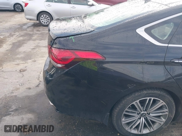 2018 Genesis G80 3.8L with VIN KMHGN4JE0JU246022, listed as a IAAI auction lot 41855219 with 106,277 mi miles. Bid and sale history available at carsss.com. Image 19.
