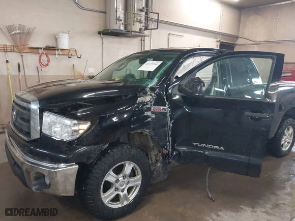 2013 Toyota Tundra 4WD Truck with VIN 5TFUW5F16DX305142, listed as a IAAI auction lot 41139364 with 212,390 mi miles. Bid and sale history available at carsss.com. Image 6.