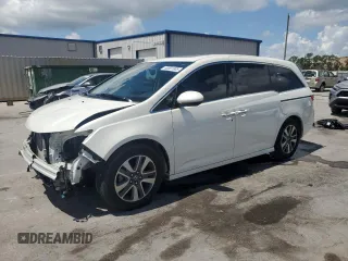 2017 Honda Odyssey Touring с VIN 5FNRL5H99HB007993, выставлен на аукционе Copart как лот 60501805 с пробегом 104 628 миль миль и Списание • Salvage title. История ставок и продаж доступна на DreamBid. Изображение 1.