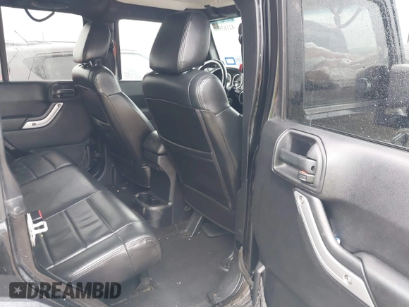 2012 Jeep Wrangler Unlimited Rubicon with VIN 1C4HJWFGXCL142804, listed as a IAAI auction lot 42183960 with 124,392 mi miles and . Bid and sale history available at DreamBid. Image 8.