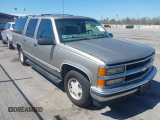 1999 Chevrolet Suburban with VIN 3GNEC16R9XG253081, listed as a IAAI auction lot 41719007 with 196,884 mi miles. Bid and sale history available at carsss.com. Image 1.