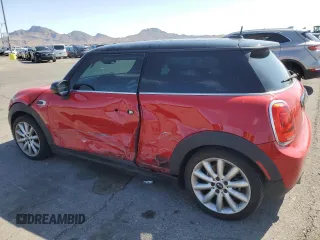 2021 MINI Hardtop Oxford Edition with VIN WMWXR3C09M2N13515, listed as a Copart auction lot 58490325 with 77,064 mi miles and Salvage title. Bid and sale history available at DreamBid. Image 2.