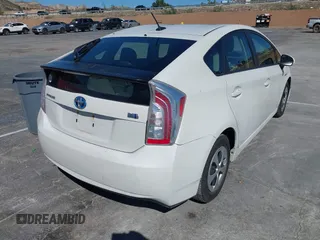 2015 Toyota Prius Four with VIN JTDKN3DU8F0426195, listed as a IAAI auction lot 41529611 with 137,377 mi miles. Bid and sale history available at carsss.com. Image 4.