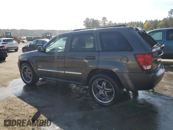 2006 Jeep Grand Cherokee Laredo with VIN 1J4HS48N96C357909, listed as a Copart auction lot 77551154 with 136,235 mi miles and Salvage Title. Bid and sale history available at carsss.com. Image 2.