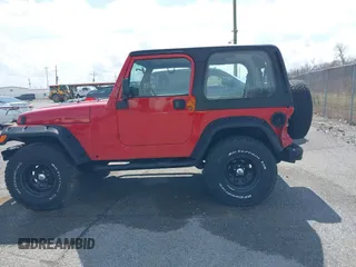 2002 Jeep Wrangler X with VIN 1J4FA39S02P739211, listed as a IAAI auction lot 41665910 with 144,118 mi miles. Bid and sale history available at carsss.com. Image 14.